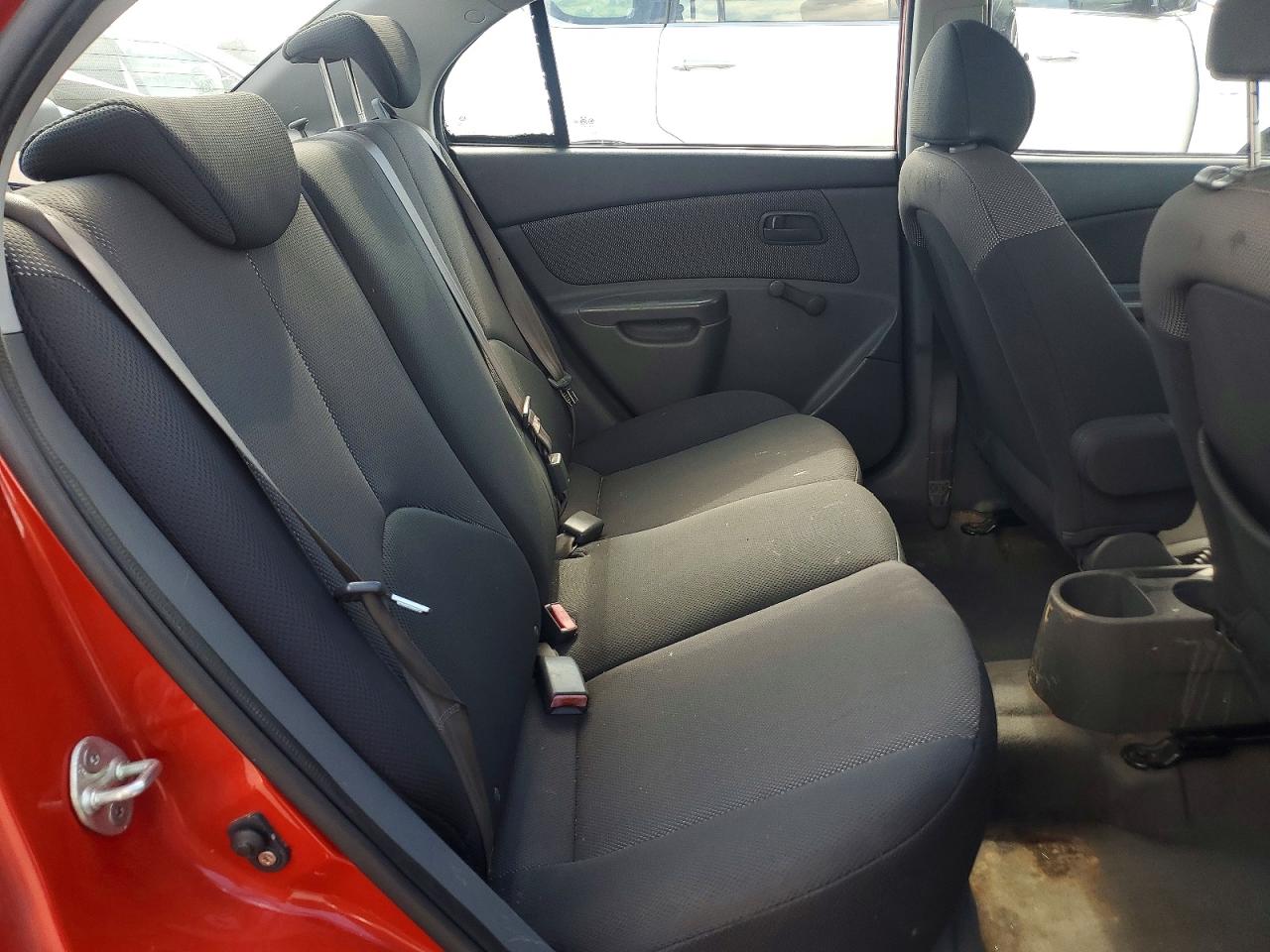 2008 Kia Rio Base Orange vin: KNADE123986322383