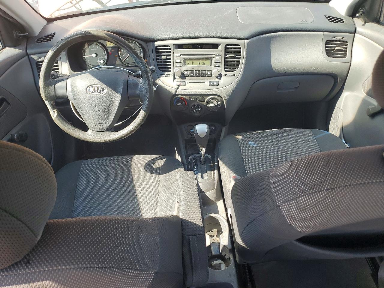 2008 Kia Rio Base Orange vin: KNADE123986322383