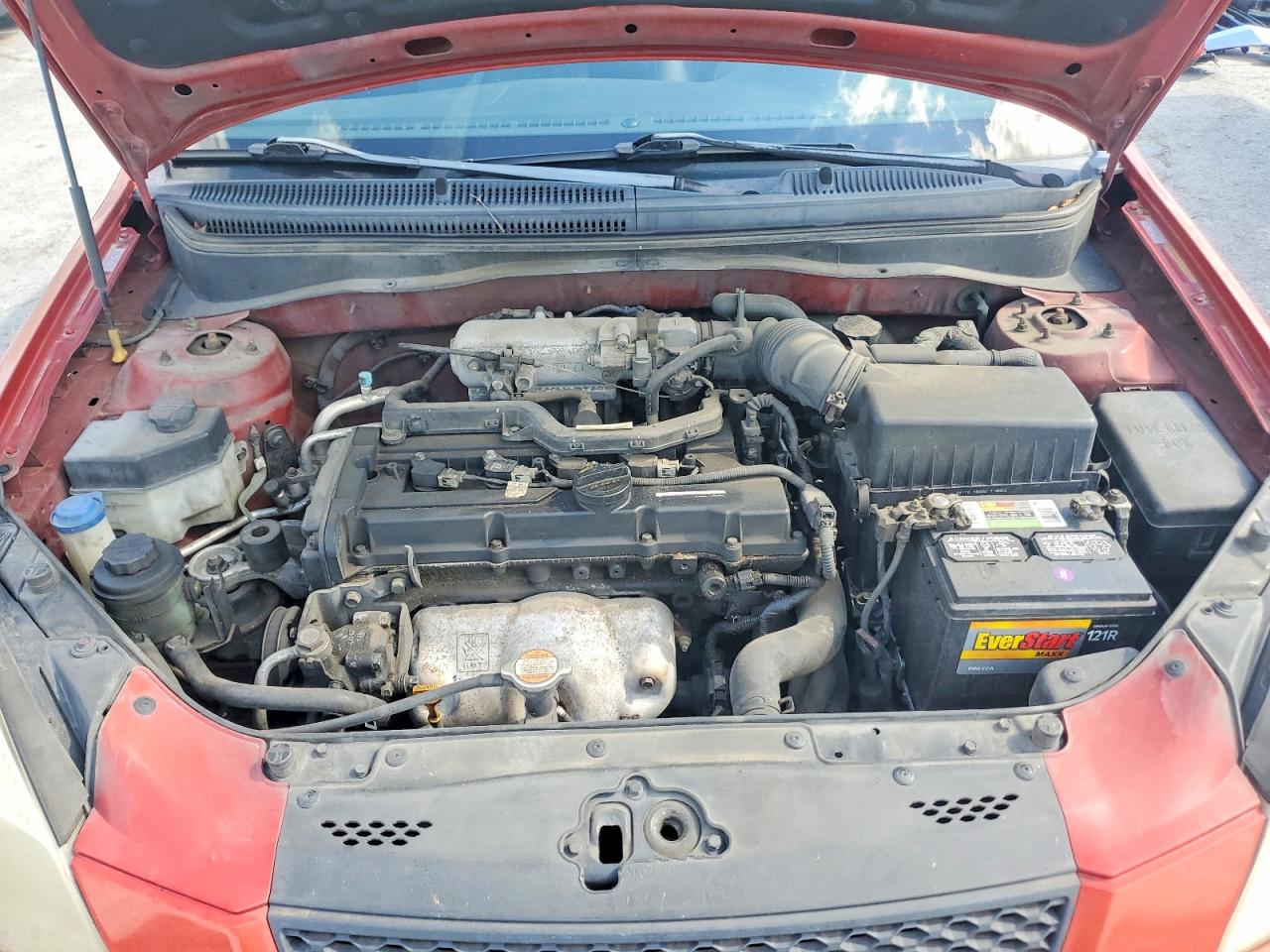 2008 Kia Rio Base Orange vin: KNADE123986322383