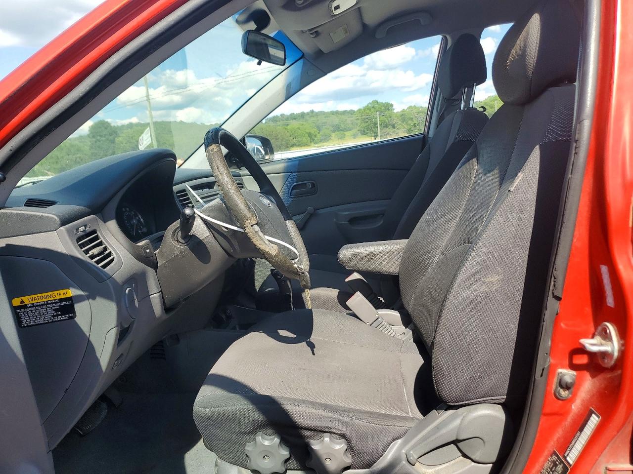 2008 Kia Rio Base Orange vin: KNADE123986322383