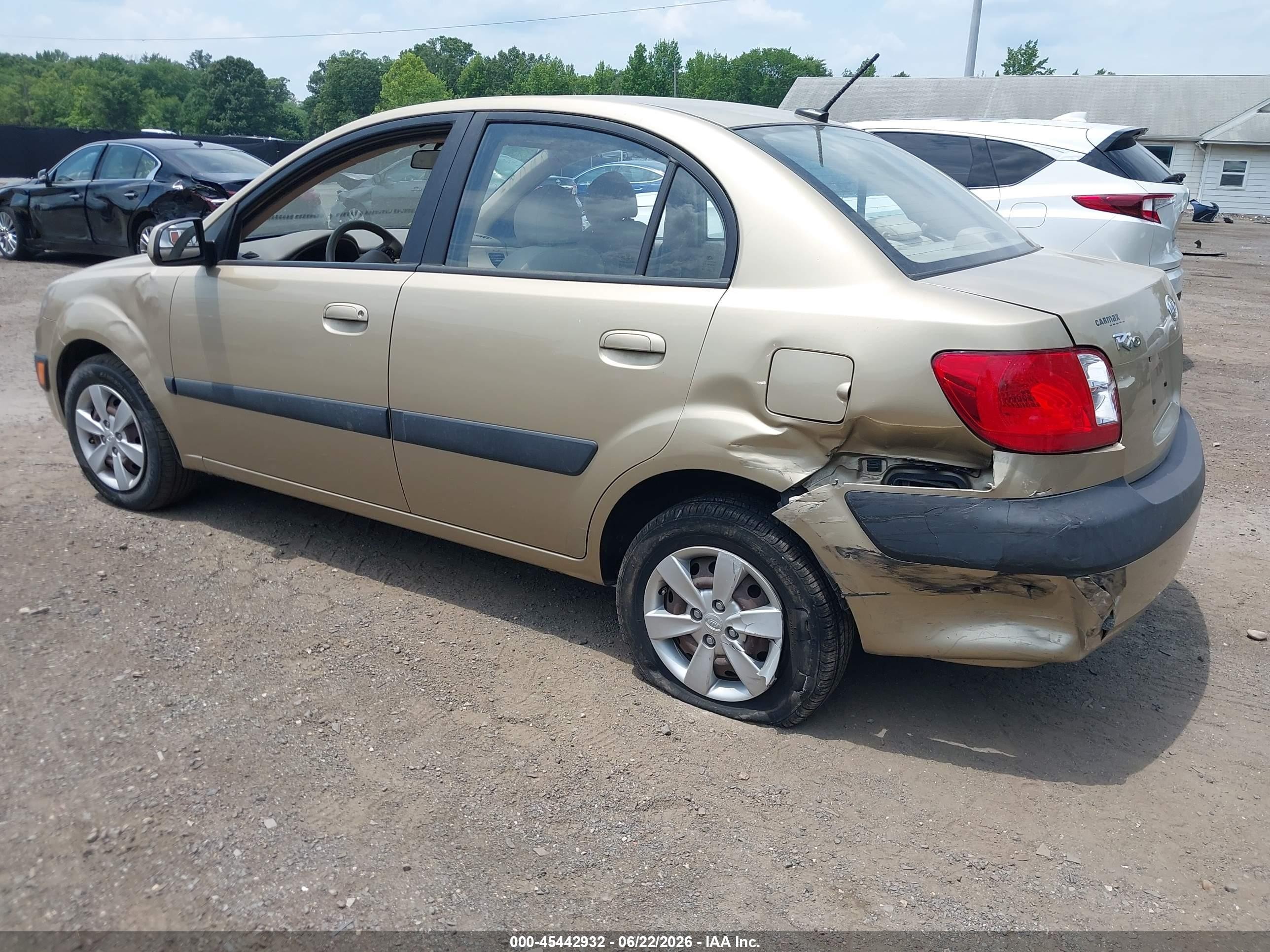 2009 Kia Rio Lx Gold vin: KNADE223096500415