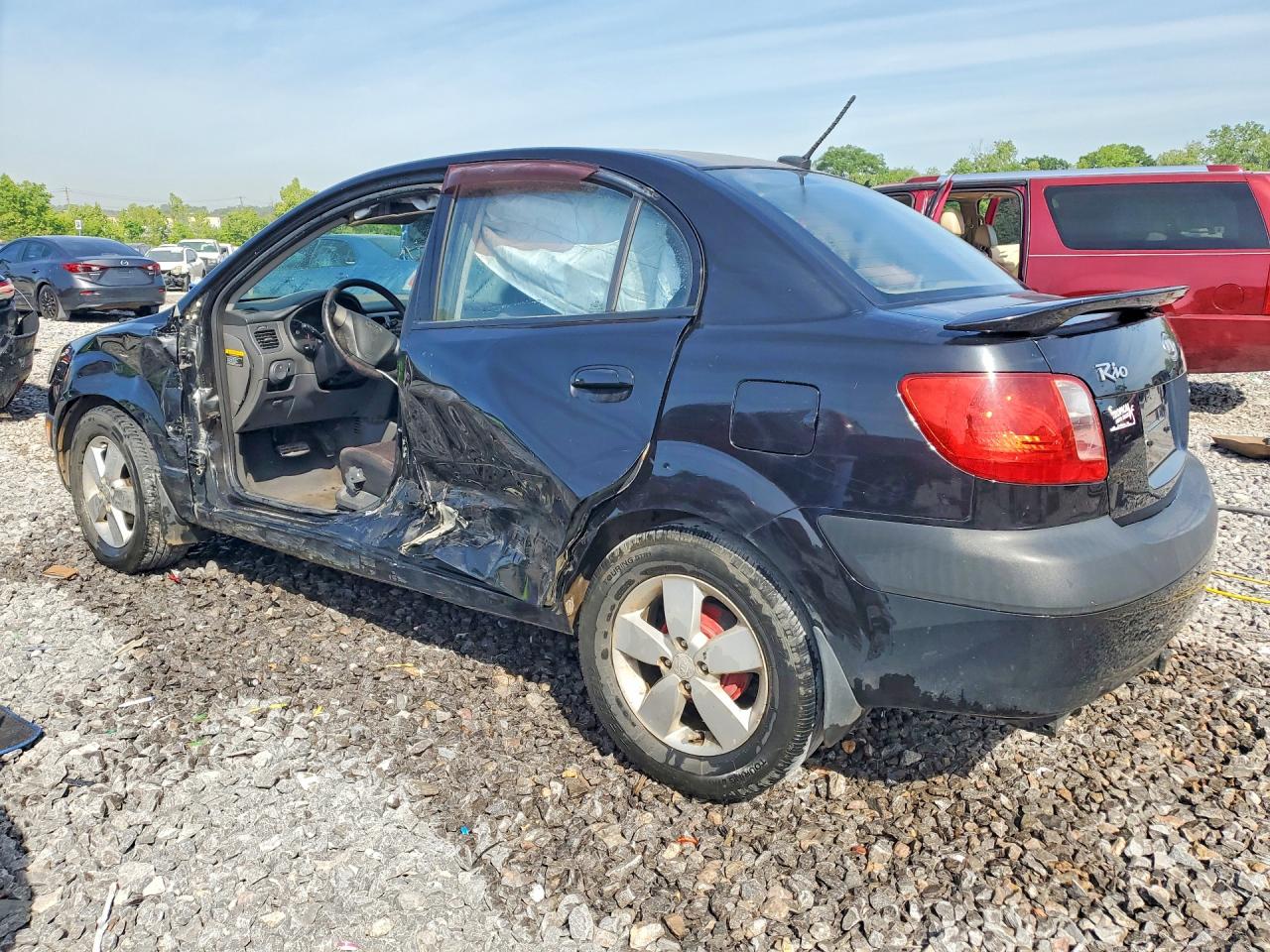 2009 Kia Rio Base Black vin: KNADE223096556726