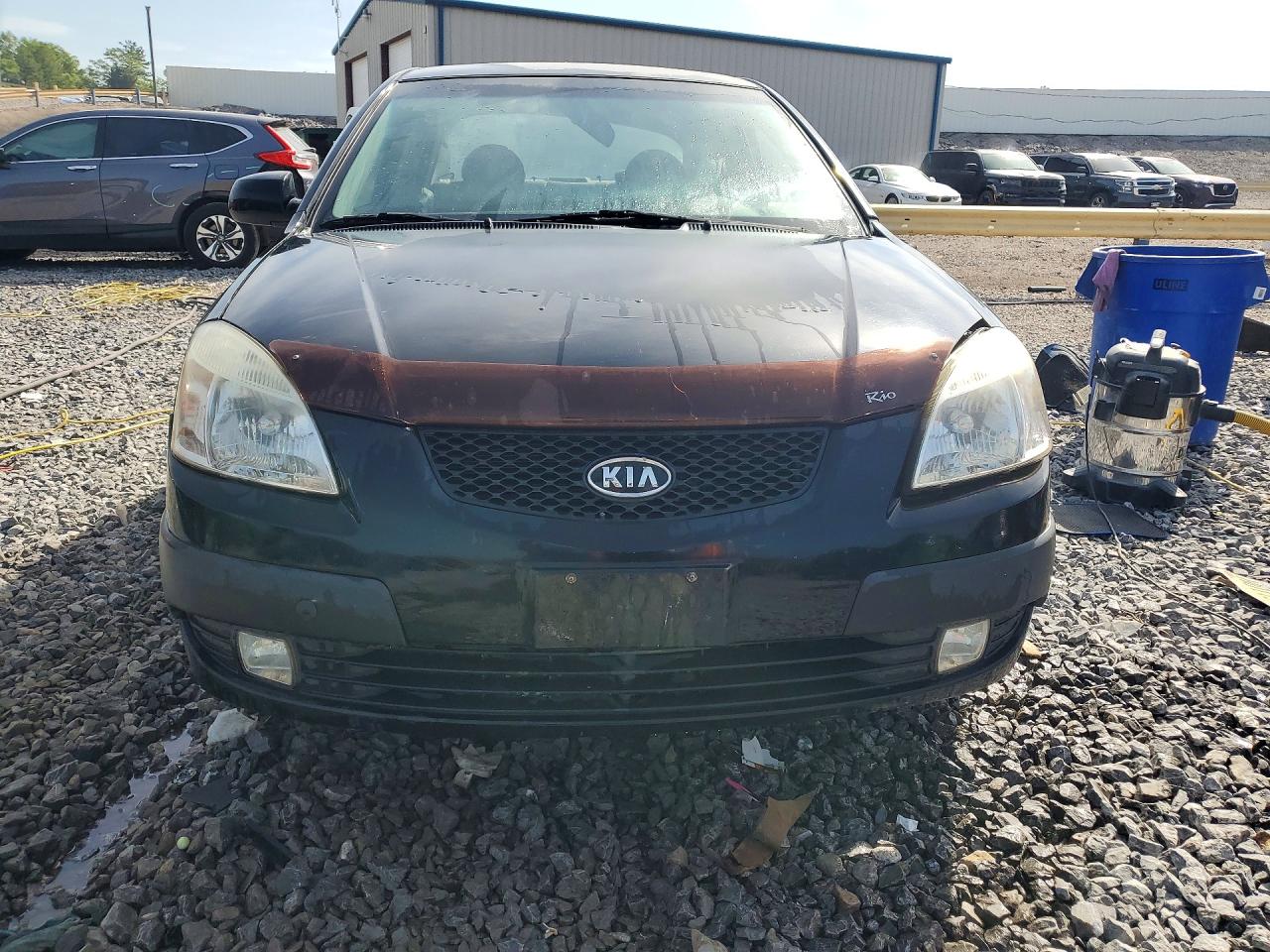 2009 Kia Rio Base Black vin: KNADE223096556726