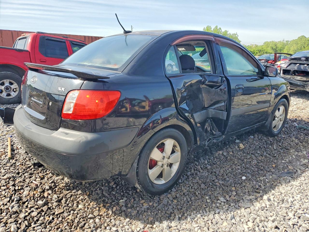 2009 Kia Rio Base Black vin: KNADE223096556726