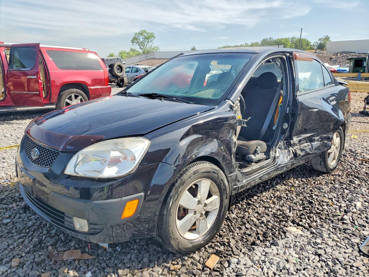 2009 Kia Rio Base Black vin: KNADE223096556726