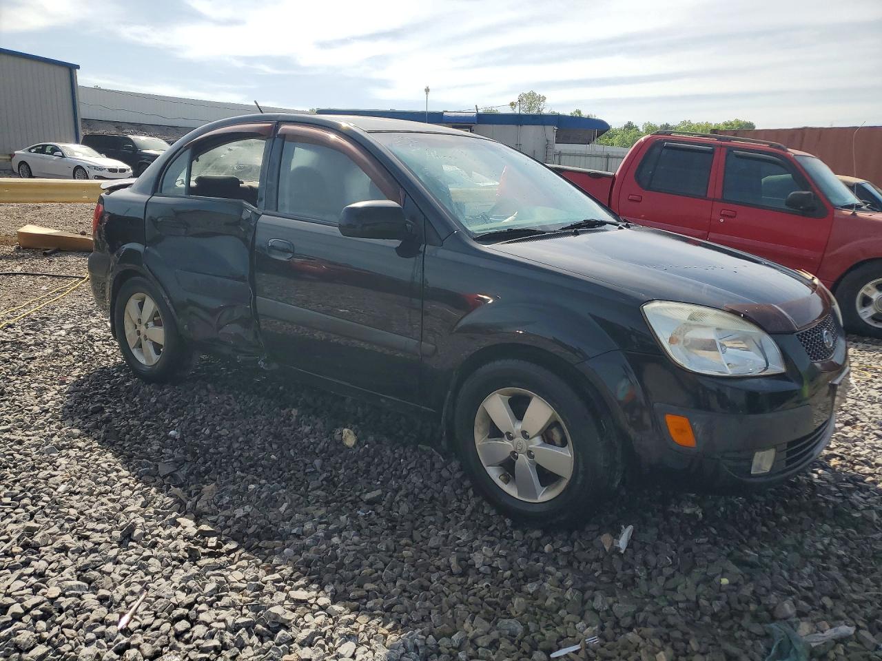 2009 Kia Rio Base Black vin: KNADE223096556726