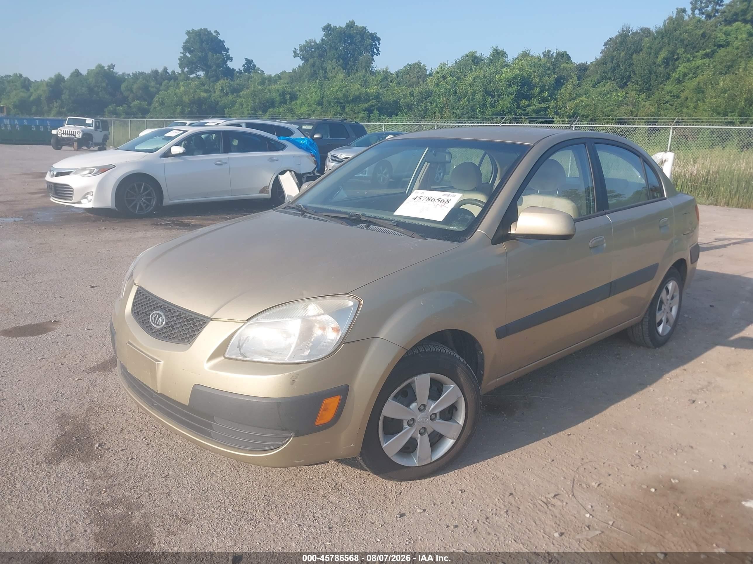2009 Kia Rio Lx Gold vin: KNADE223296521802