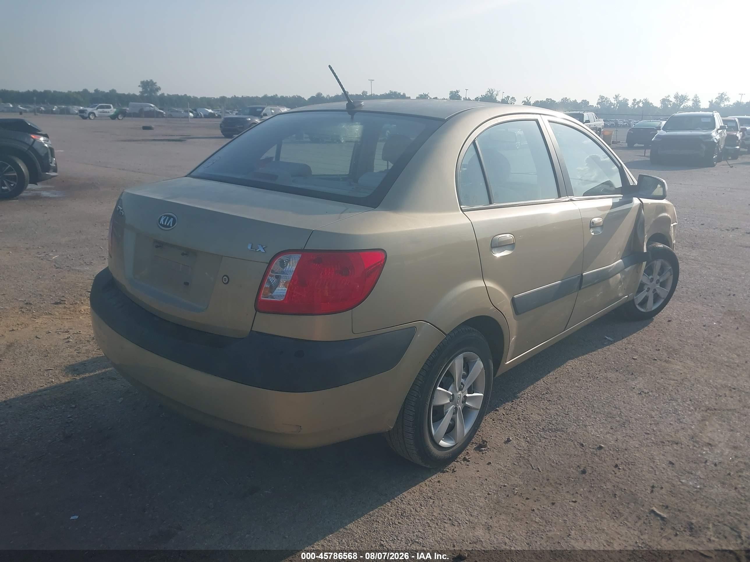 2009 Kia Rio Lx Gold vin: KNADE223296521802
