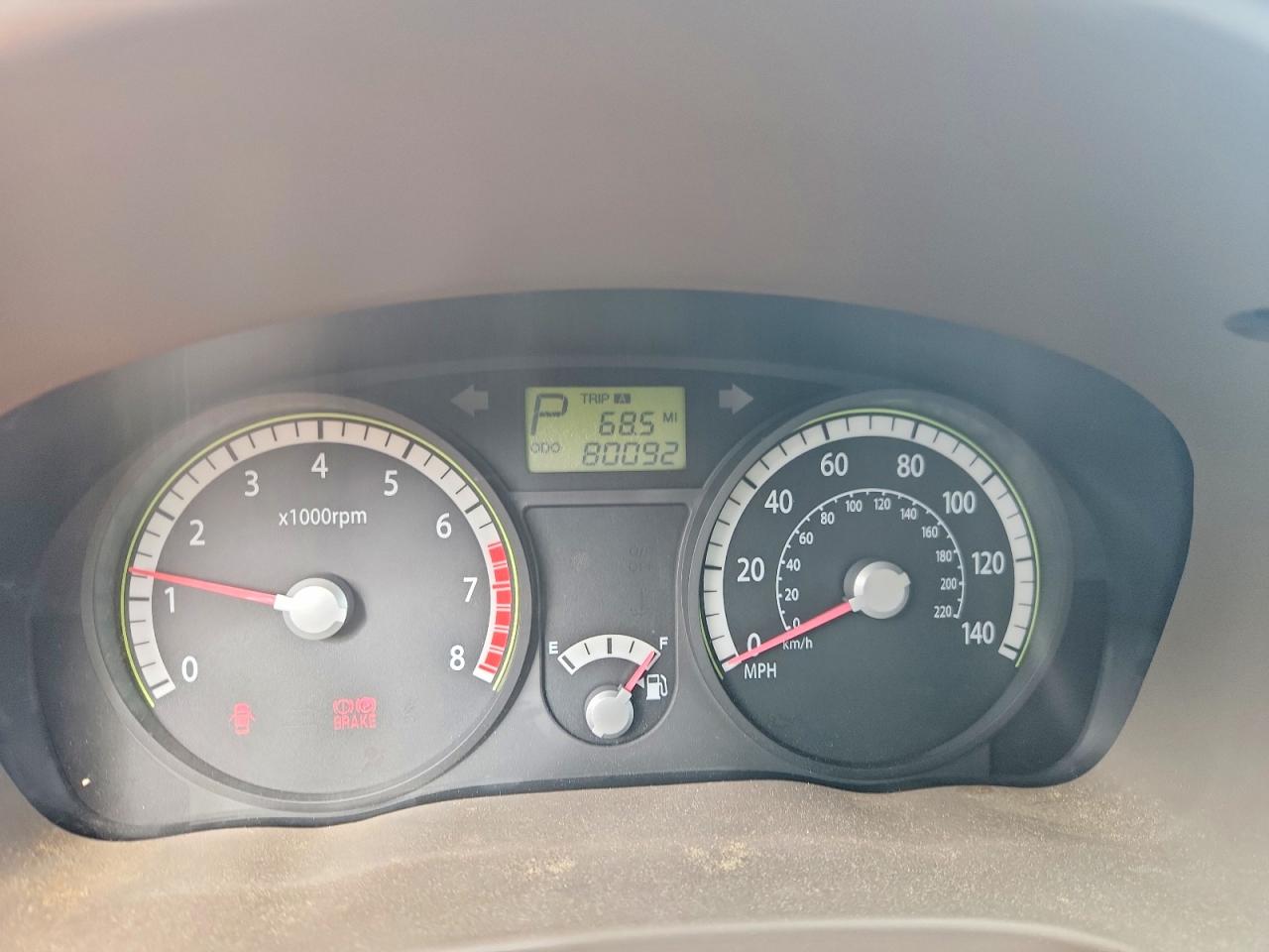 2009 Kia Rio Base Tan vin: KNADE223296538602