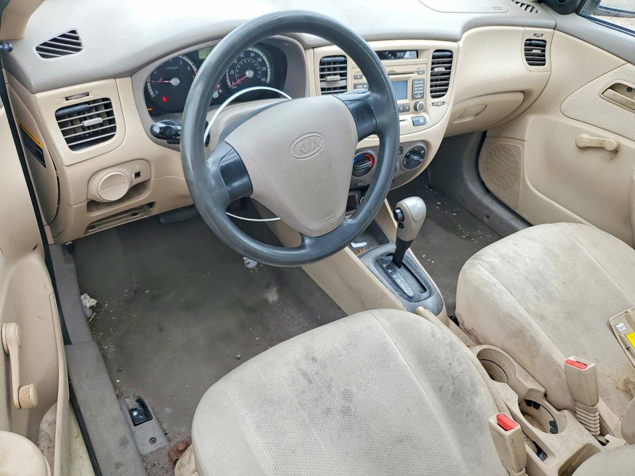 2009 Kia Rio Base Beige vin: KNADE223396519198