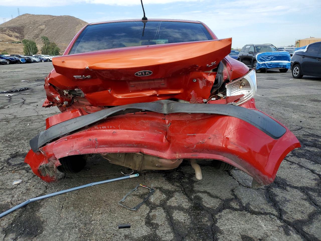 2009 Kia Rio Base Orange vin: KNADE223396573617