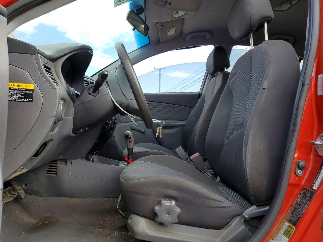 2009 Kia Rio Base Orange vin: KNADE223396573617