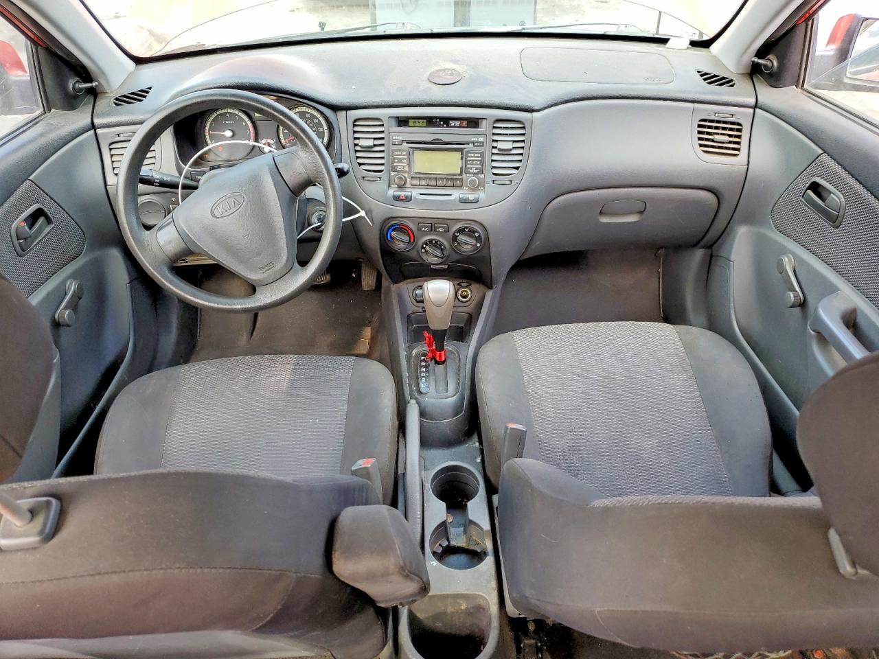 2009 Kia Rio Base Orange vin: KNADE223396573617