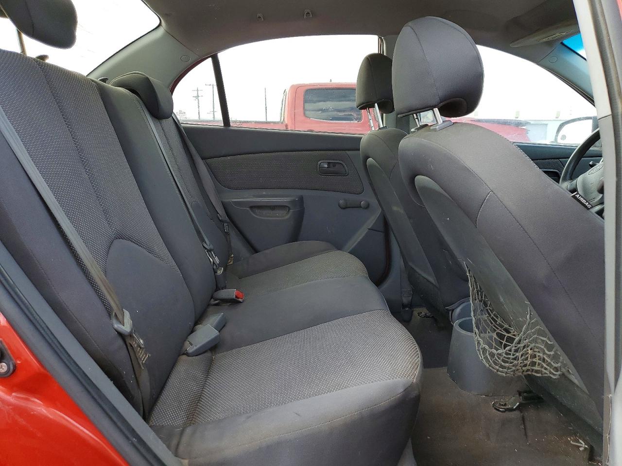 2009 Kia Rio Base Orange vin: KNADE223396573617