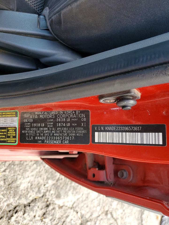 2009 Kia Rio Base Orange vin: KNADE223396573617