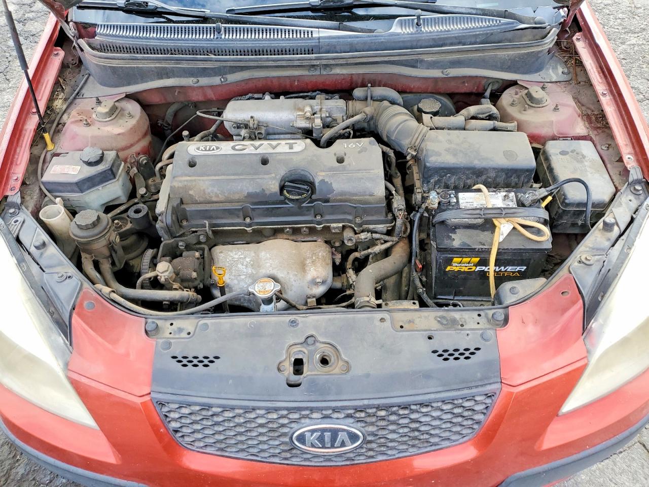 2009 Kia Rio Base Orange vin: KNADE223396573617