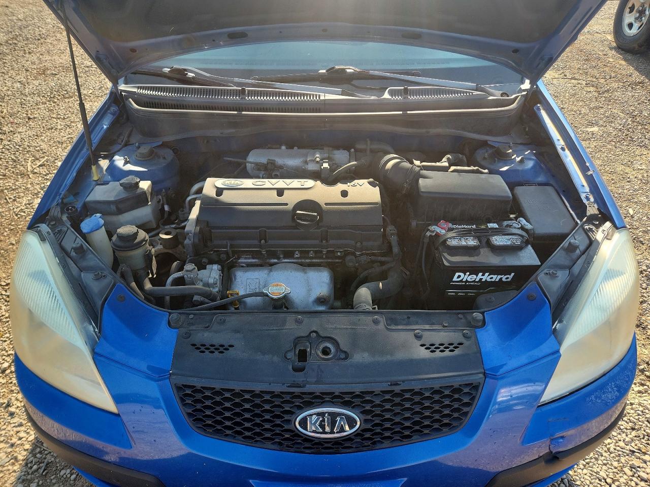 2009 Kia Rio Base Blue vin: KNADE223396576100