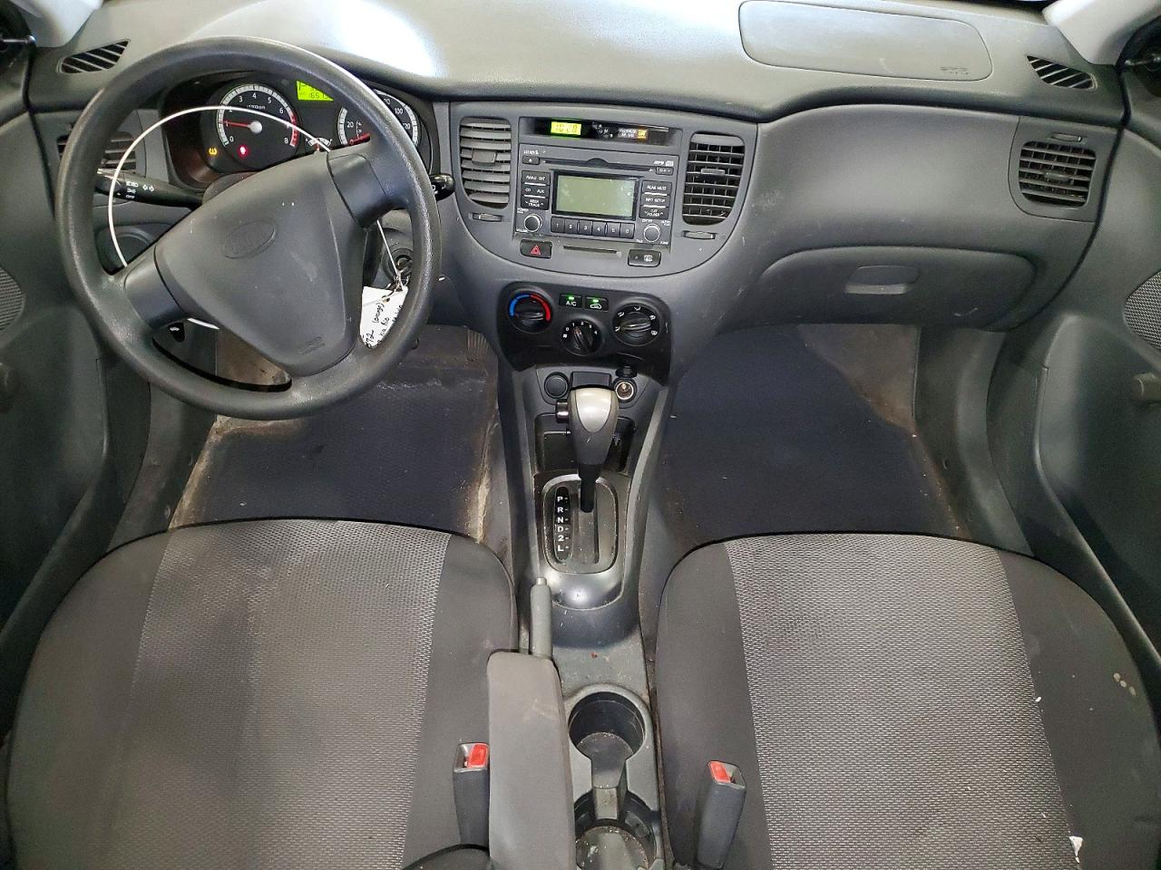 2009 Kia Rio Base Orange vin: KNADE223496459481