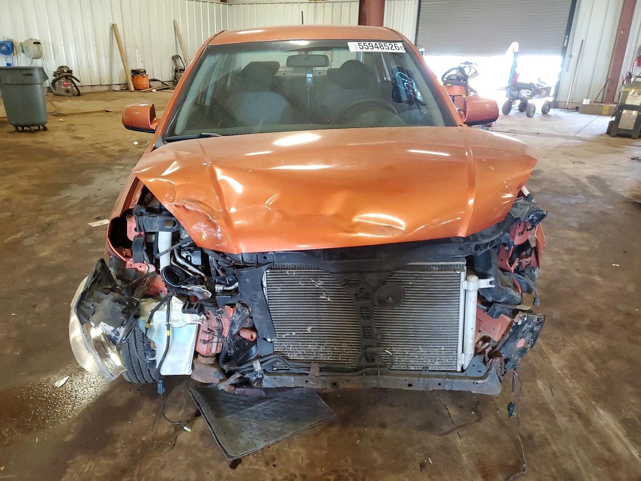 2009 Kia Rio Base Orange vin: KNADE223496459481