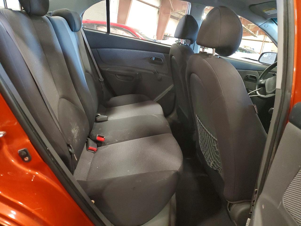 2009 Kia Rio Base Orange vin: KNADE223496459481