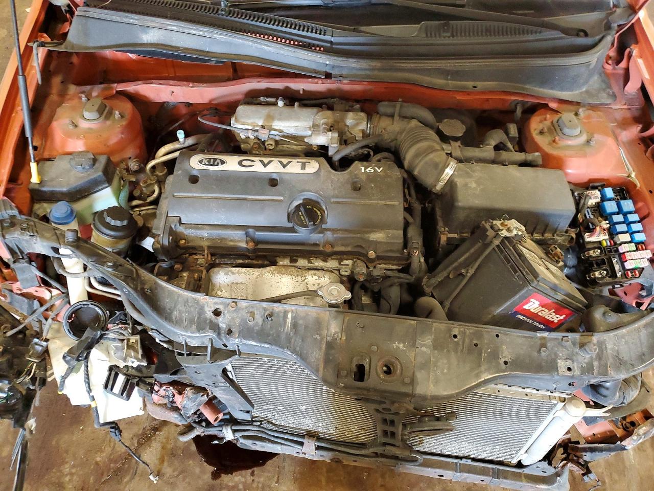 2009 Kia Rio Base Orange vin: KNADE223496459481