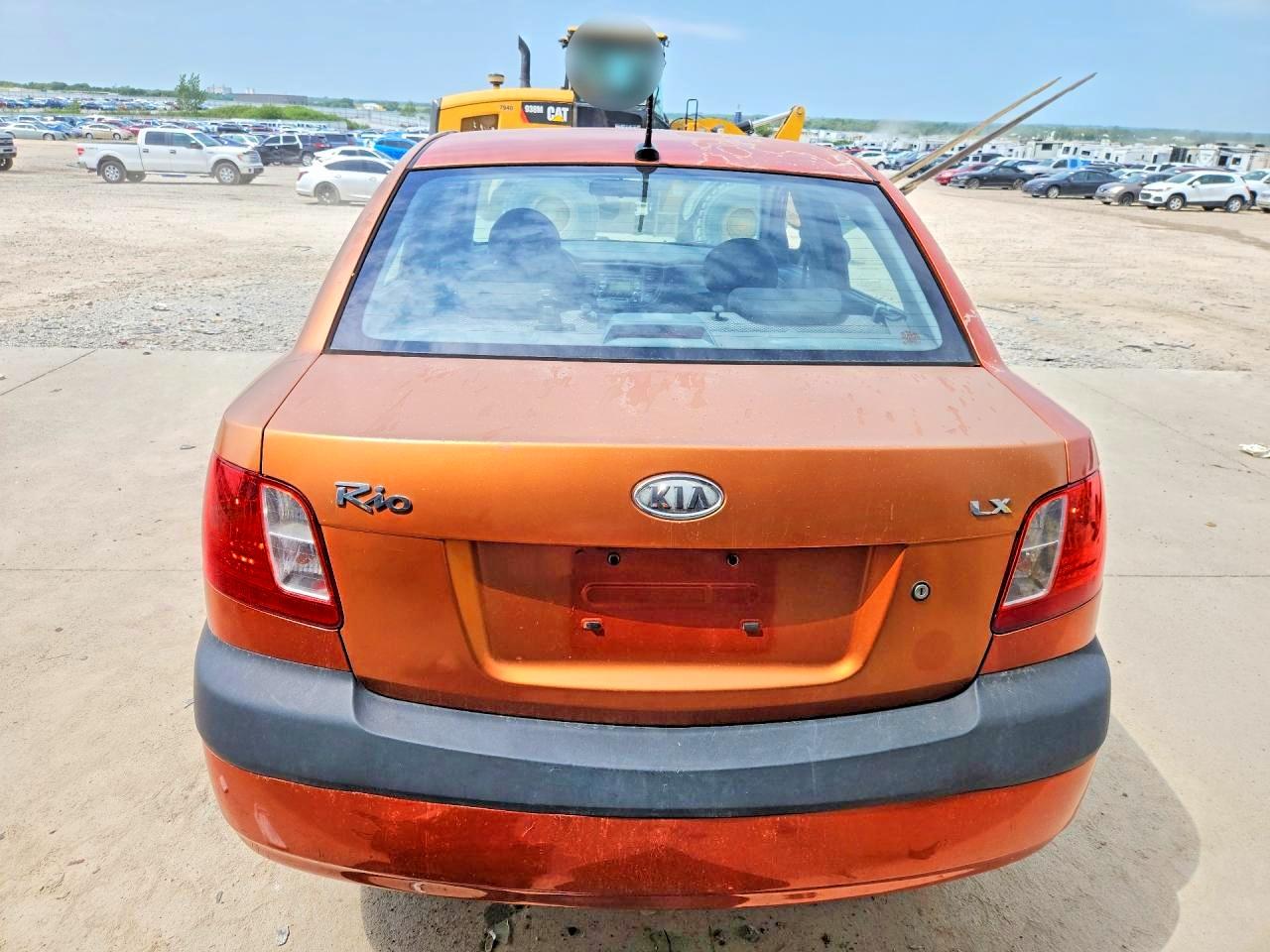 2009 Kia Rio Base Orange vin: KNADE223496534261