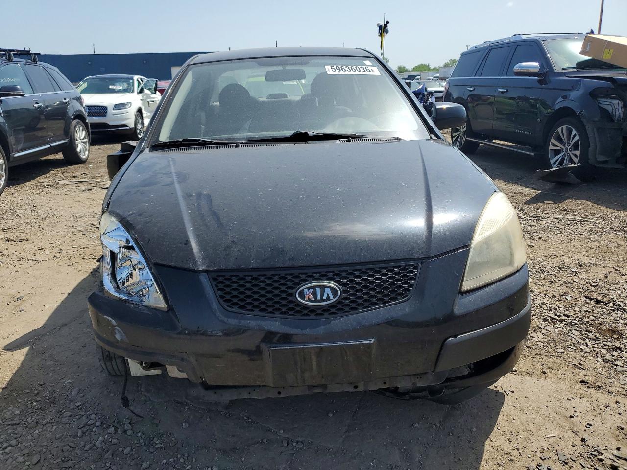 2009 Kia Rio Base Black vin: KNADE223596547987