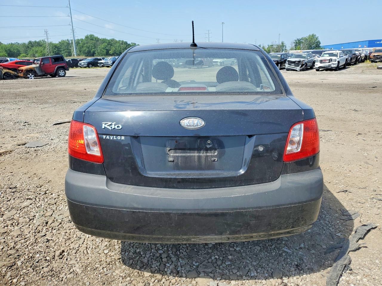 2009 Kia Rio Base Black vin: KNADE223596547987