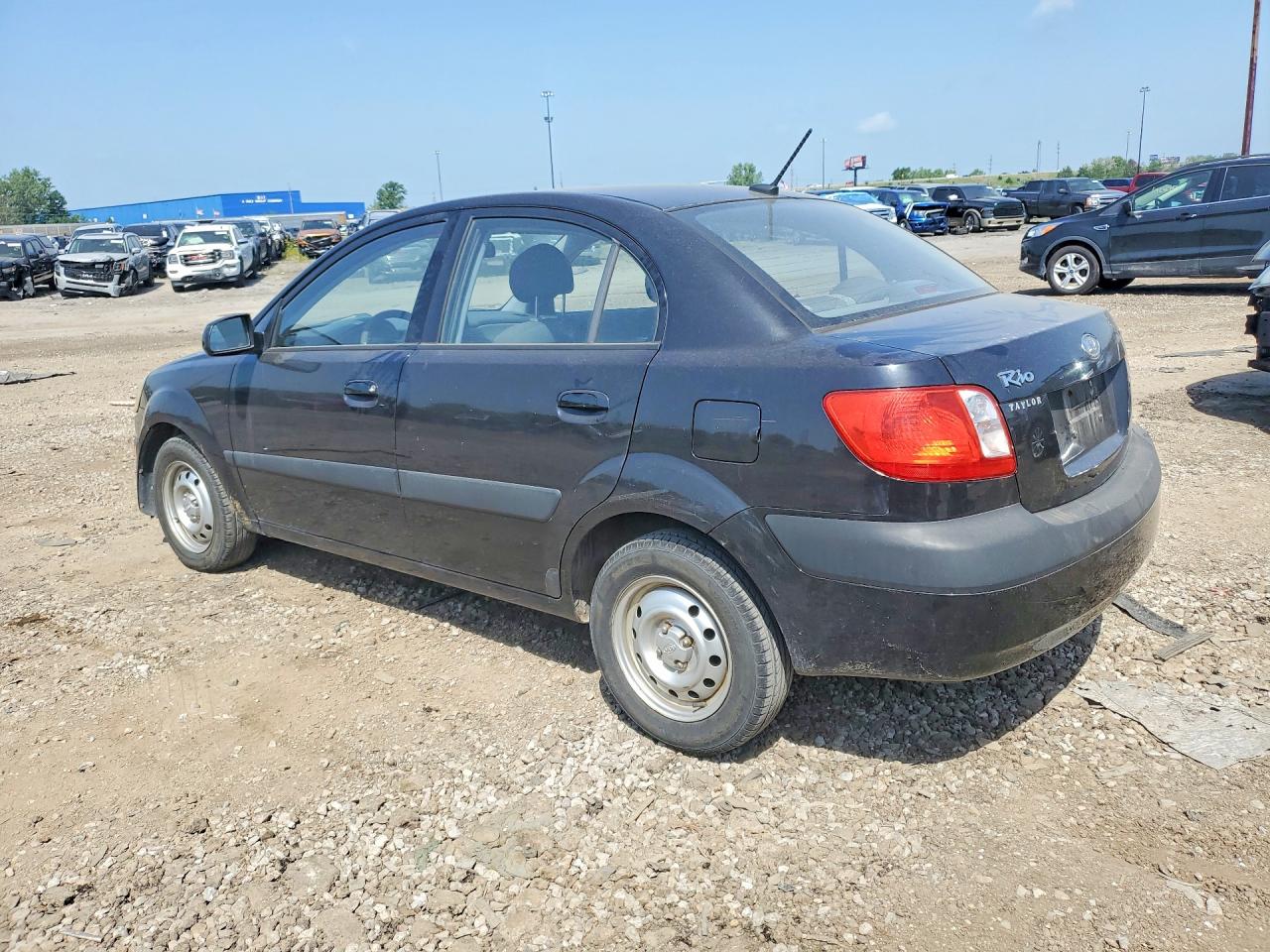 2009 Kia Rio Base Black vin: KNADE223596547987