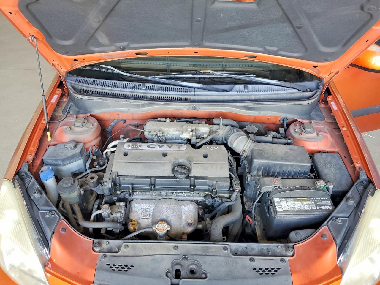 2009 Kia Rio Base Orange vin: KNADE223796534285
