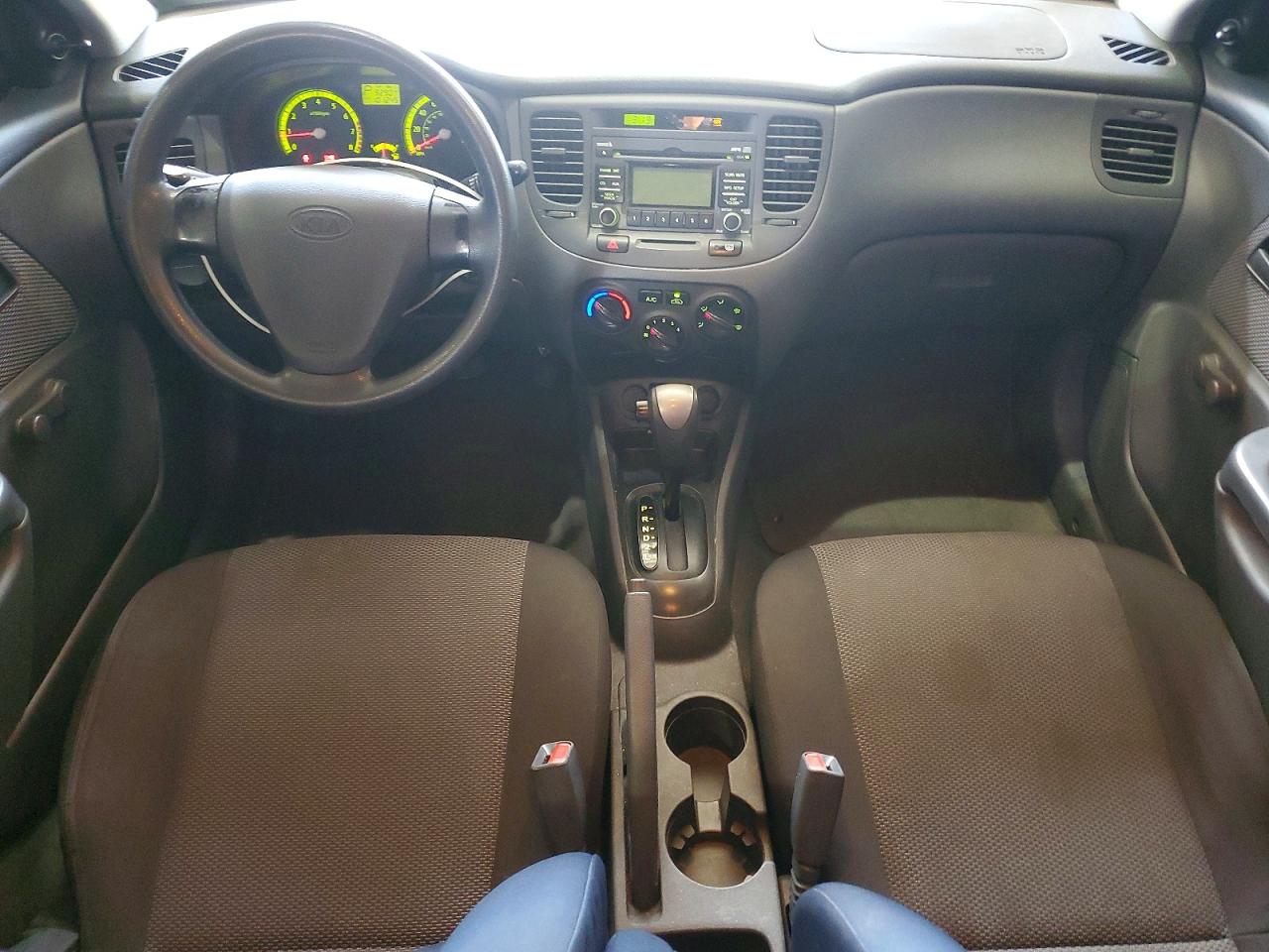 2009 Kia Rio Base Orange vin: KNADE223796534285