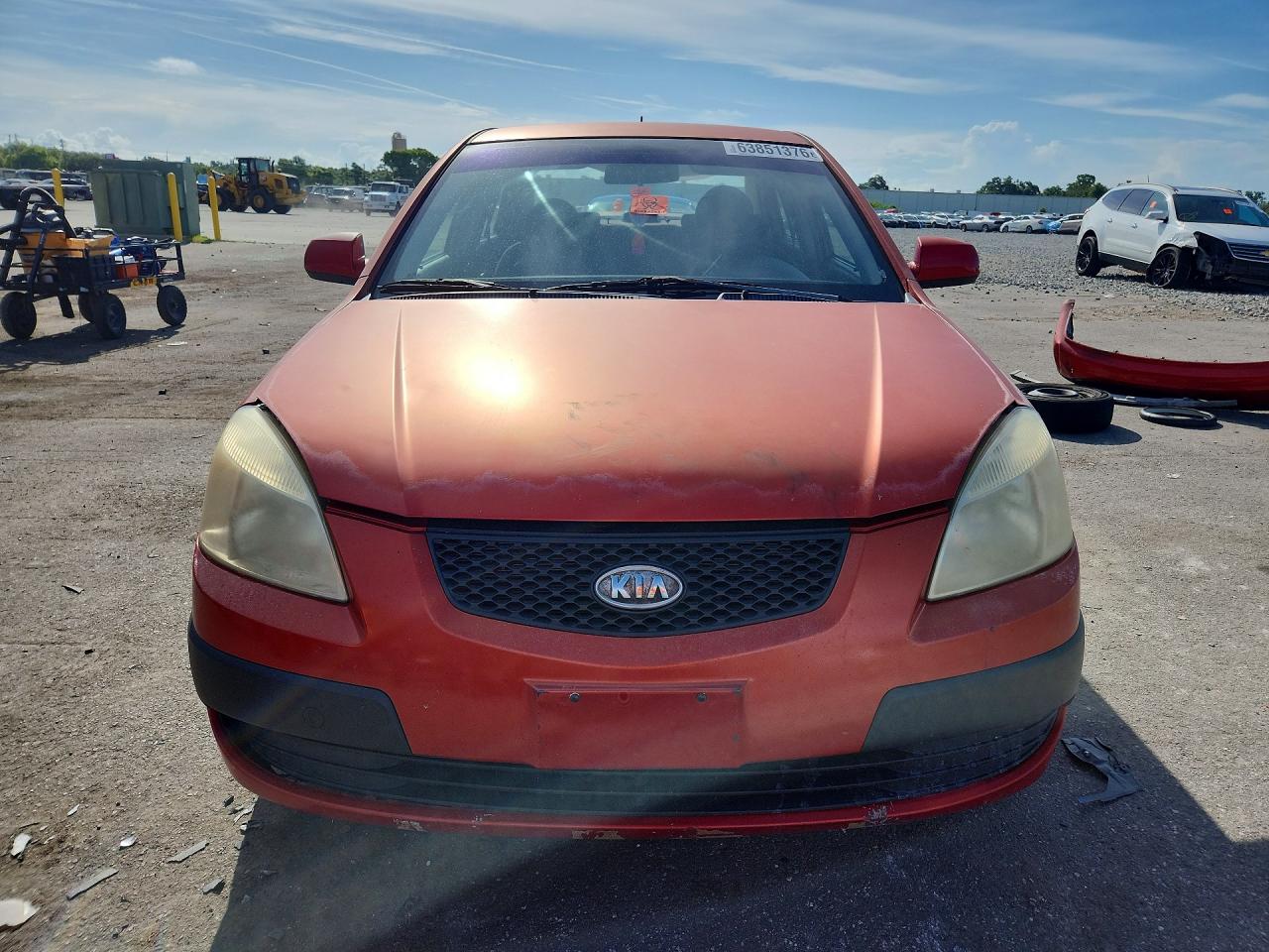 2009 Kia Rio Base Orange vin: KNADE223896447463