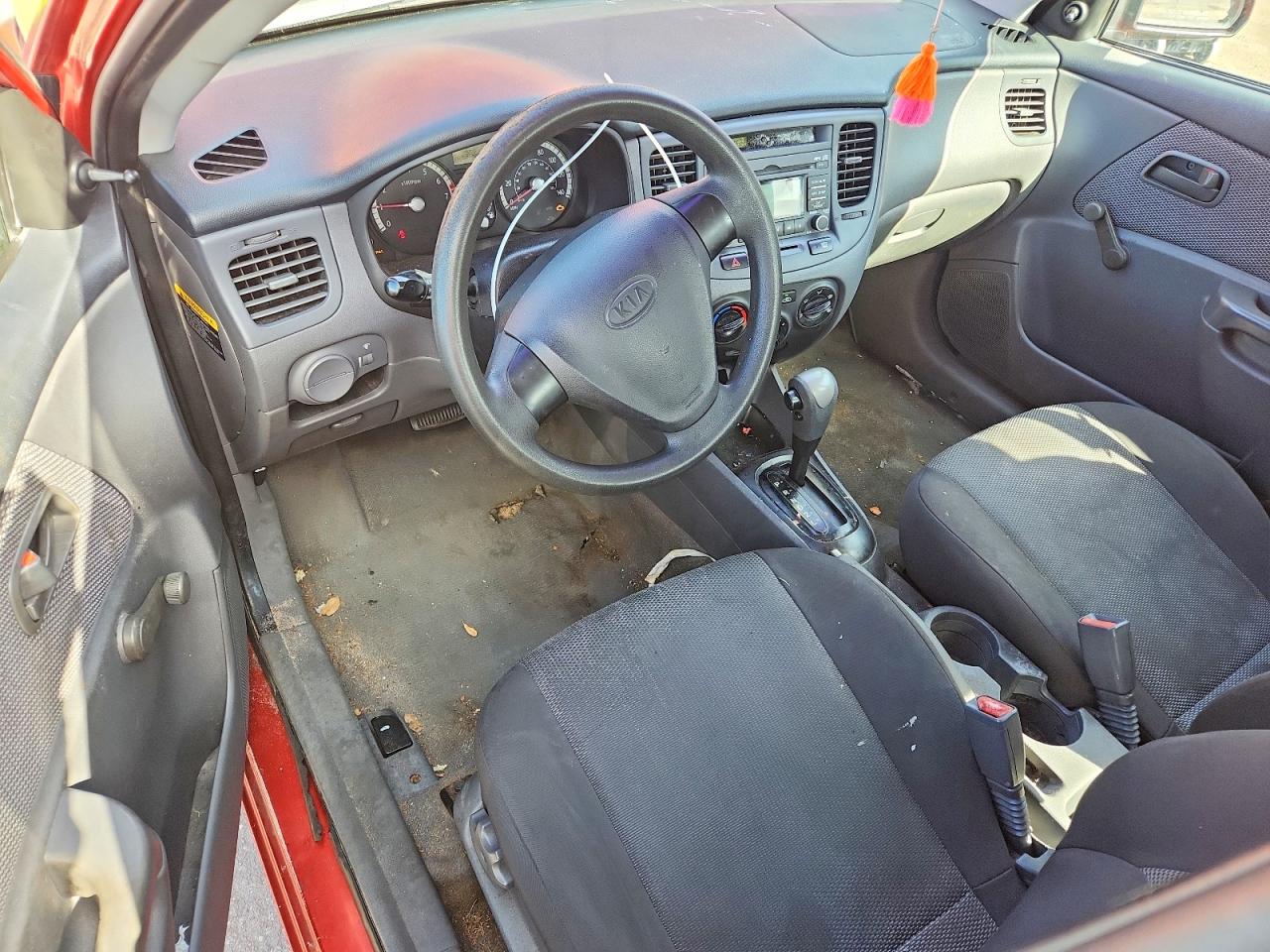 2009 Kia Rio Base Orange vin: KNADE223896447463