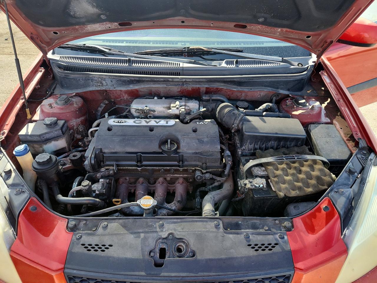 2009 Kia Rio Base Orange vin: KNADE223896447463