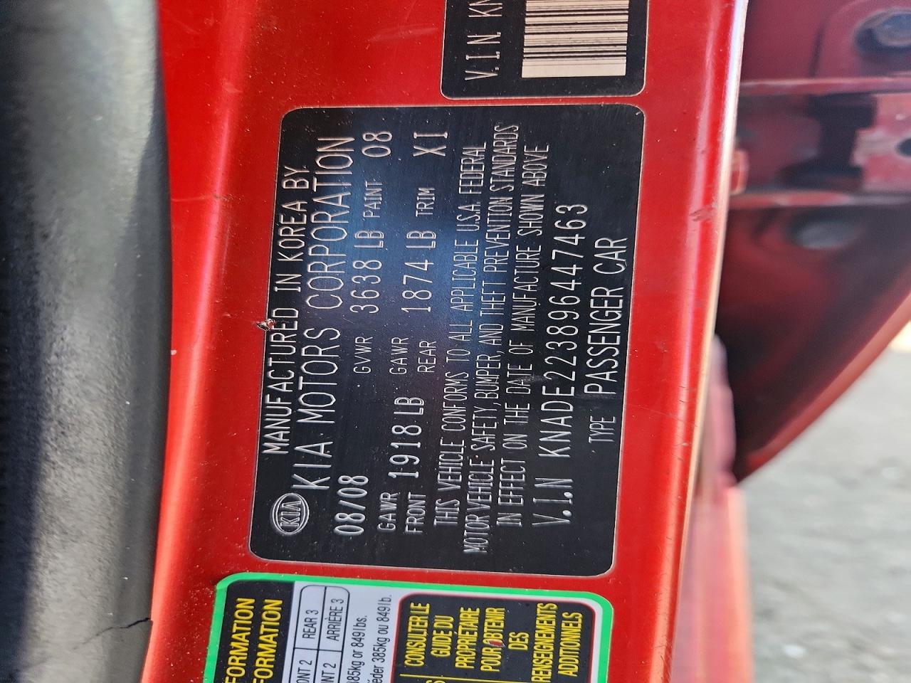 2009 Kia Rio Base Orange vin: KNADE223896447463