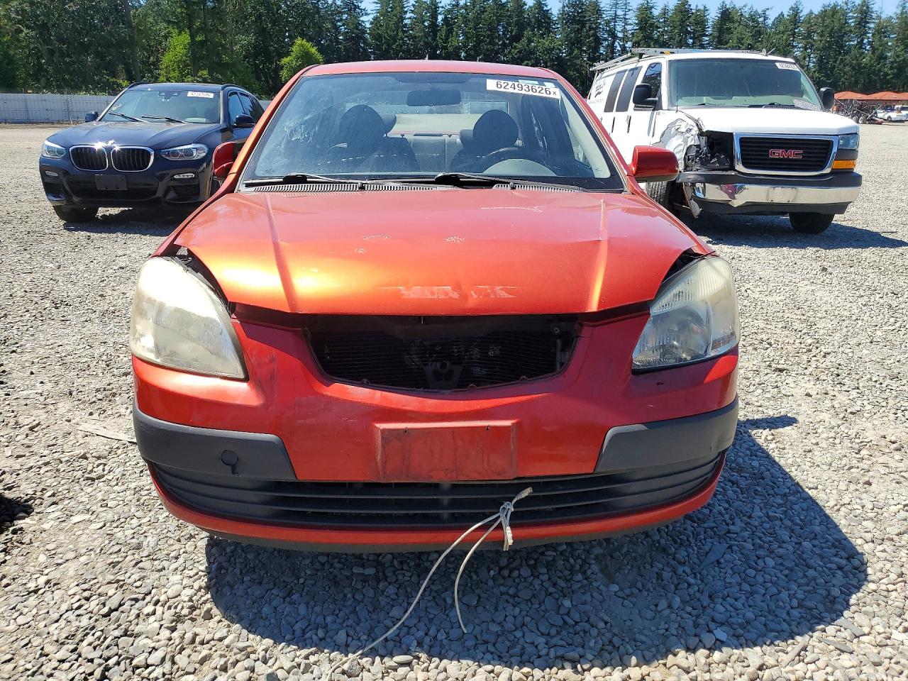 2009 Kia Rio Base Red vin: KNADE223896551029