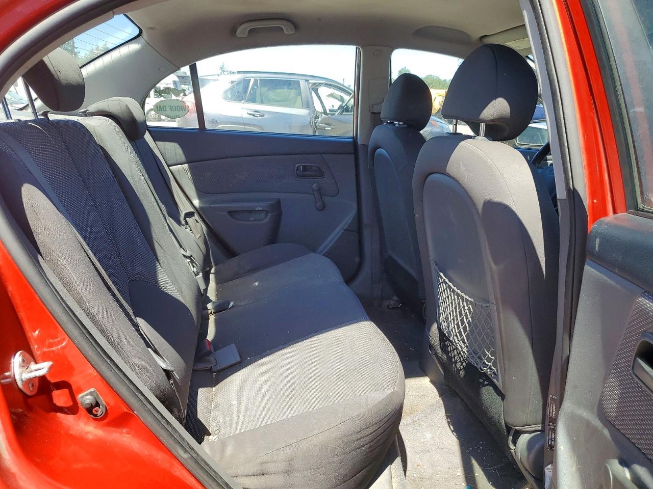 2009 Kia Rio Base Red vin: KNADE223896551029