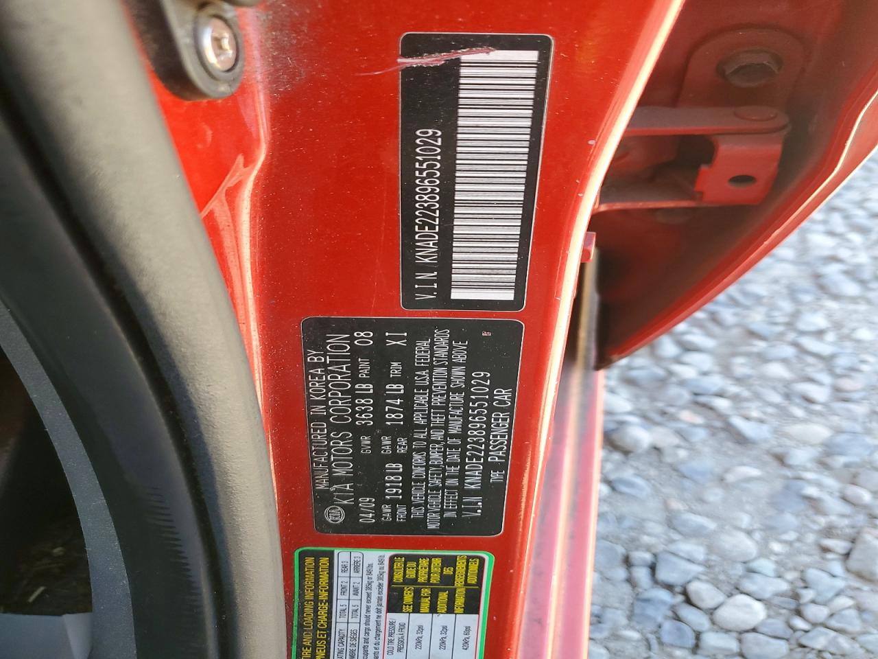 2009 Kia Rio Base Red vin: KNADE223896551029