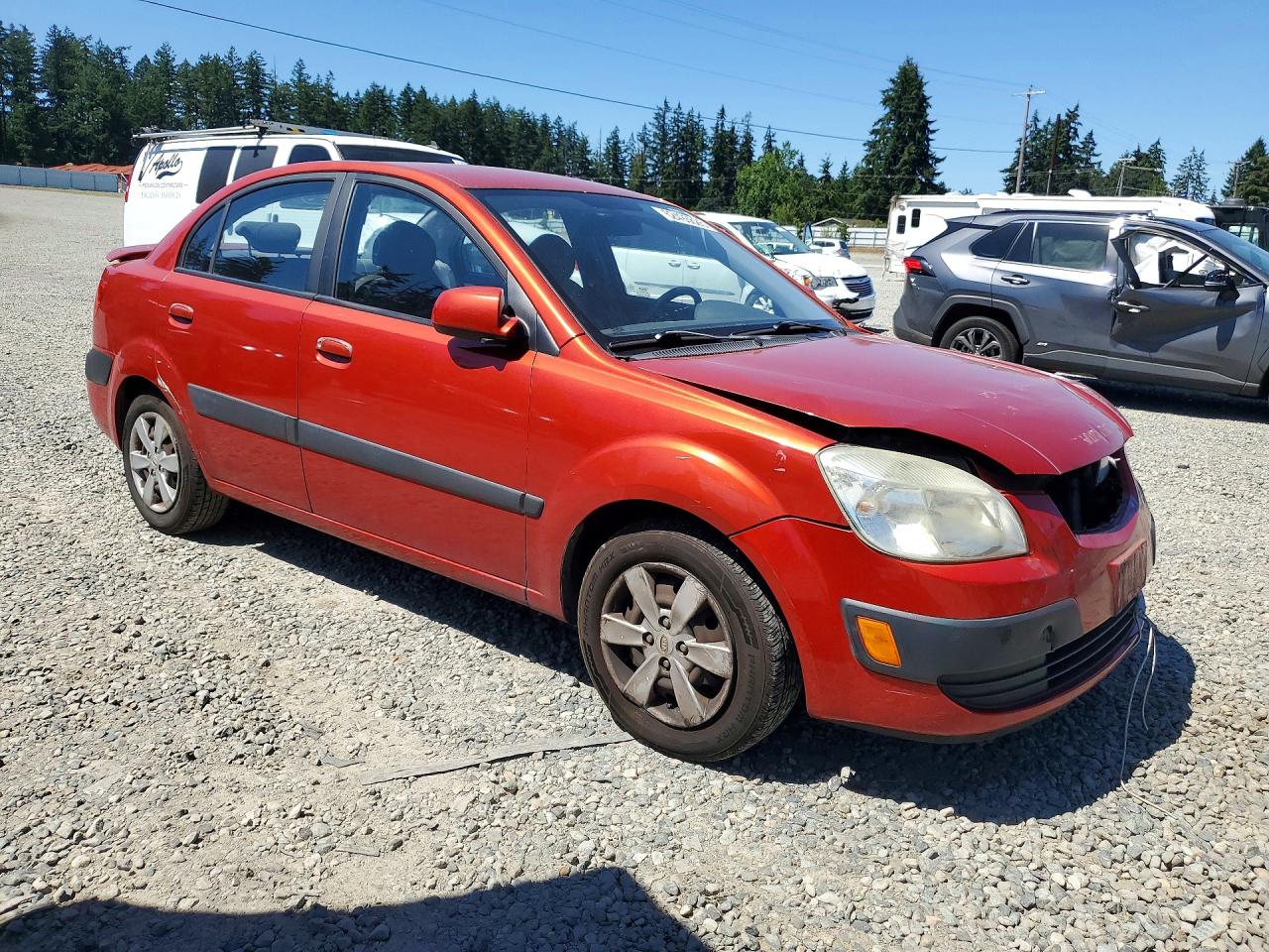2009 Kia Rio Base Red vin: KNADE223896551029