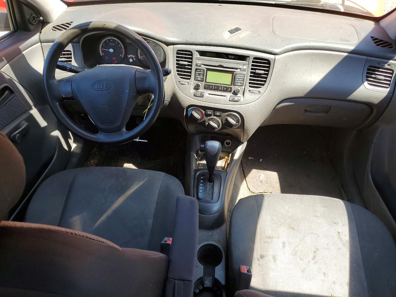 2009 Kia Rio Base Red vin: KNADE223896551029