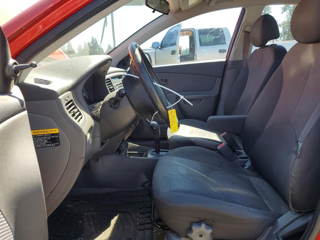 2009 Kia Rio Base Red vin: KNADE223896551029