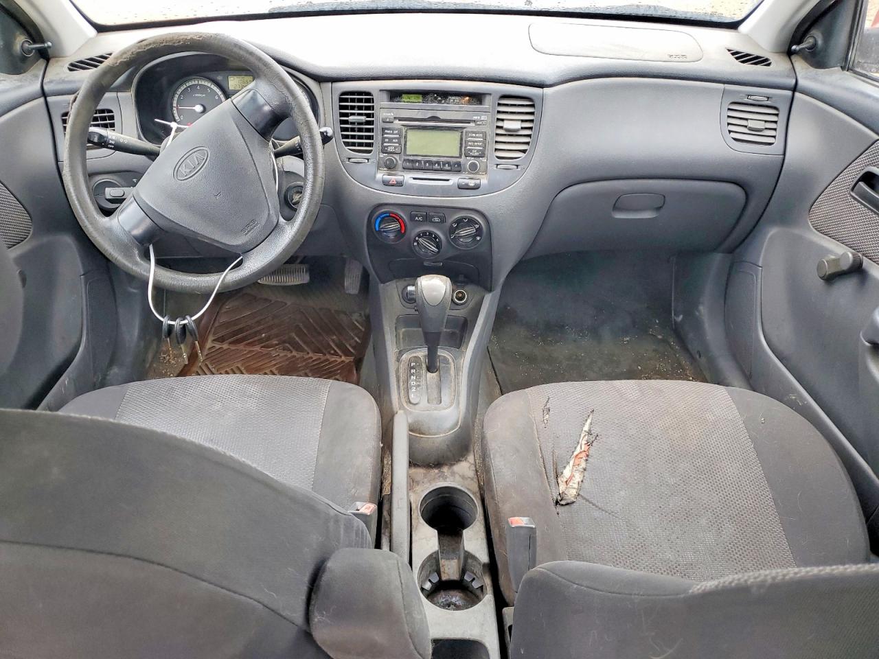 2009 Kia Rio Base Orange vin: KNADE223996499071