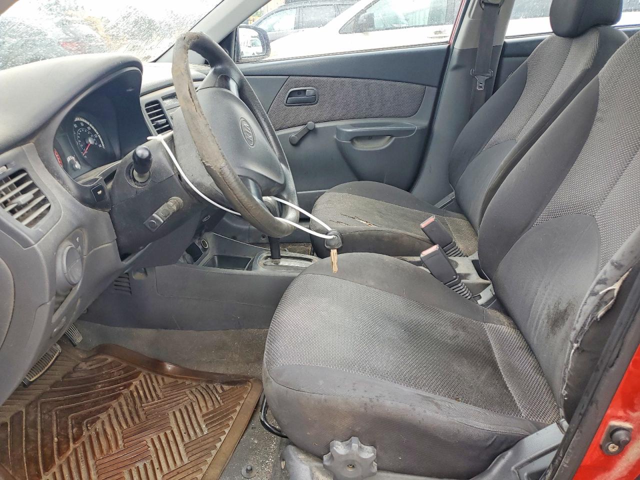2009 Kia Rio Base Orange vin: KNADE223996499071