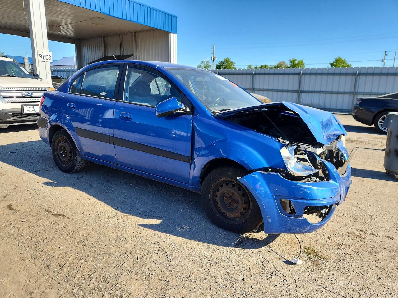 2009 Kia Rio Base Blue vin: KNADE223X96455905