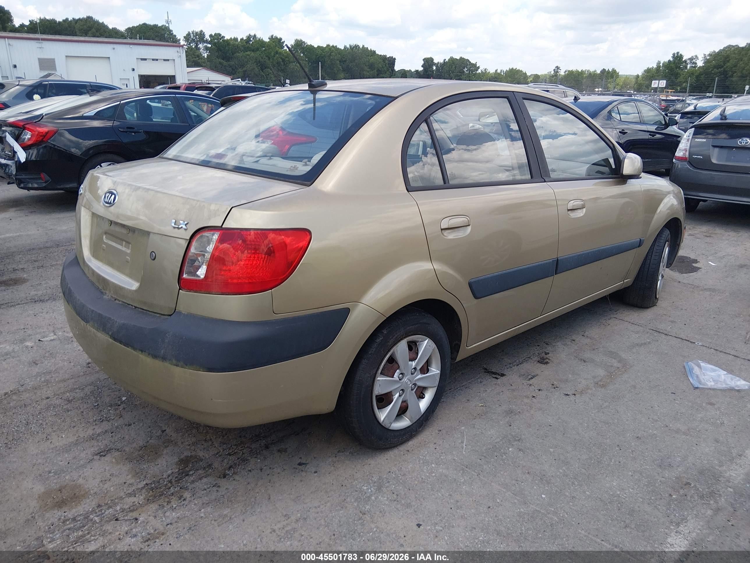 2009 Kia Rio Lx Gold vin: KNADE223X96500406