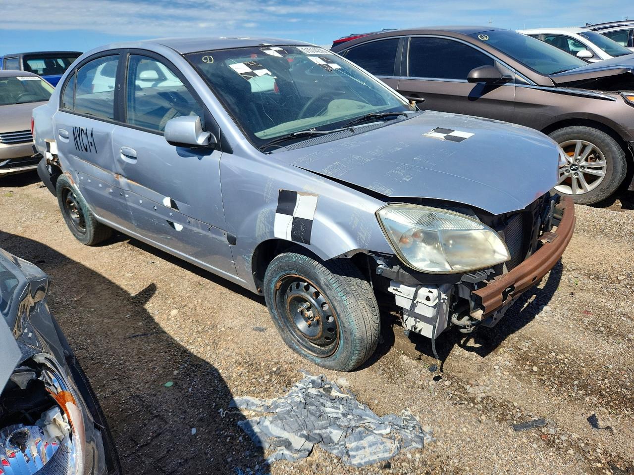 2009 Kia Rio Base Silver vin: KNADE223X96522874