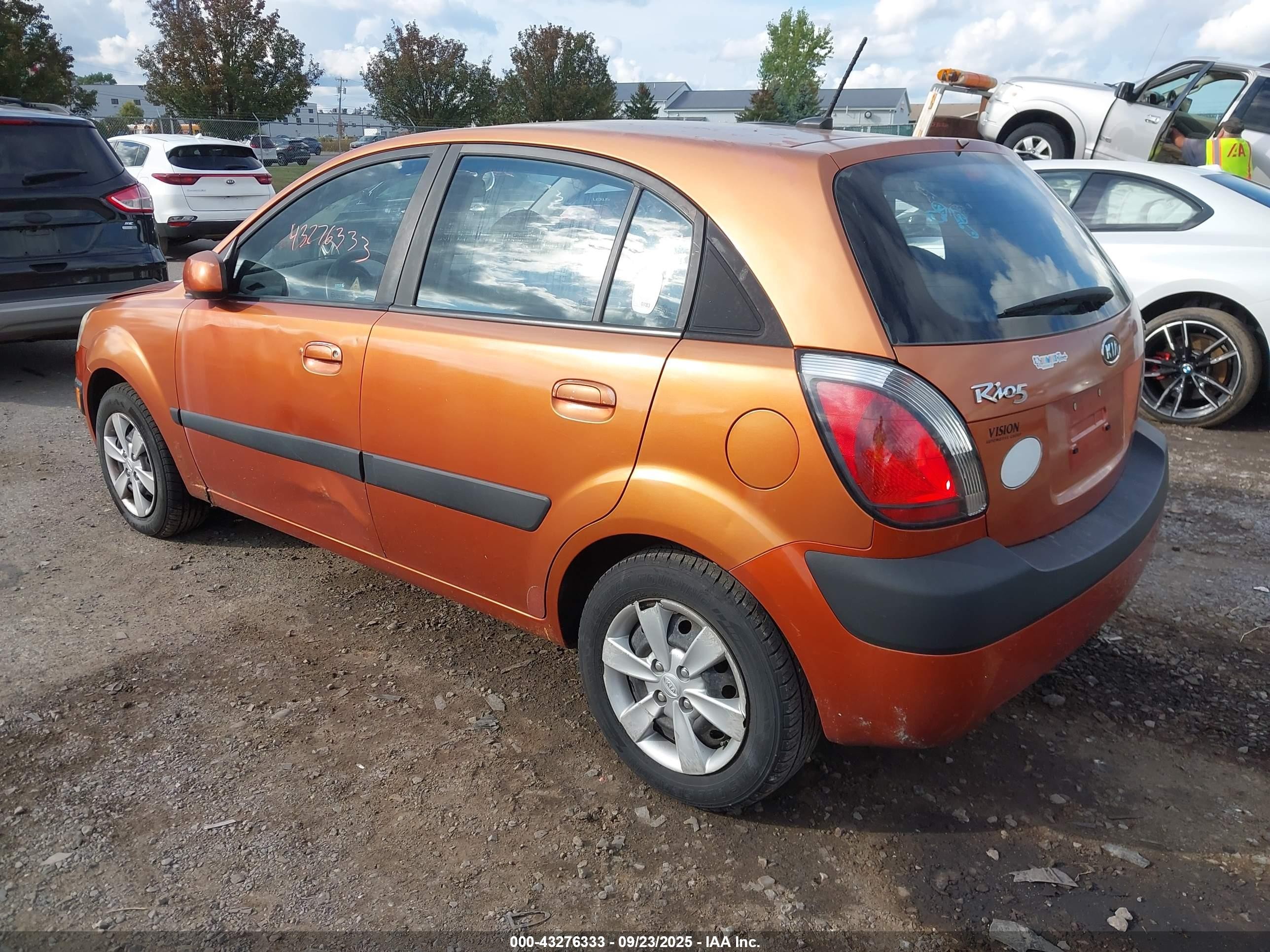 2009 Kia Rio5 Lx Orange vin: KNADE243696544173