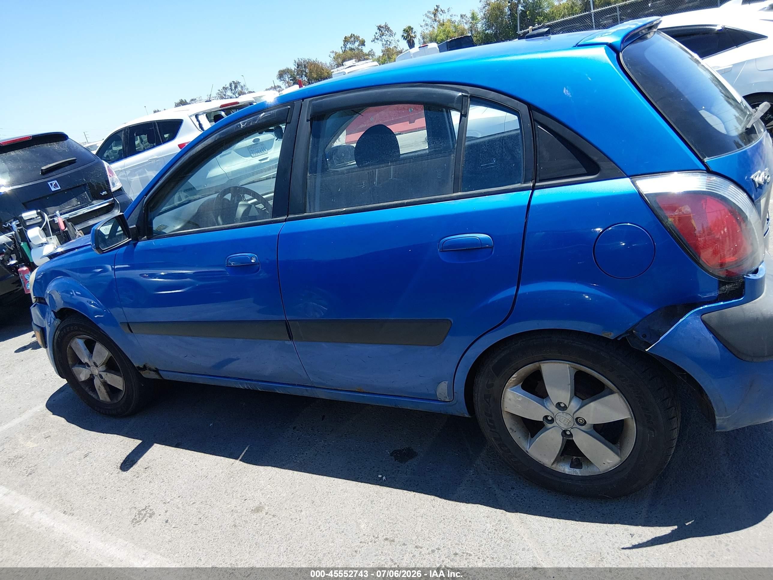 2009 Kia Rio5 Sx Blue vin: KNADE243896587428