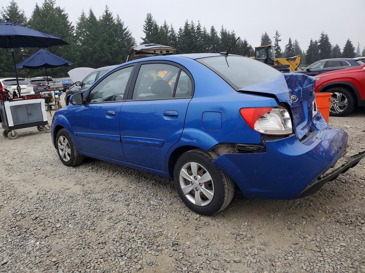 2010 Kia Rio Base Blue vin: KNADH4A33A6635106