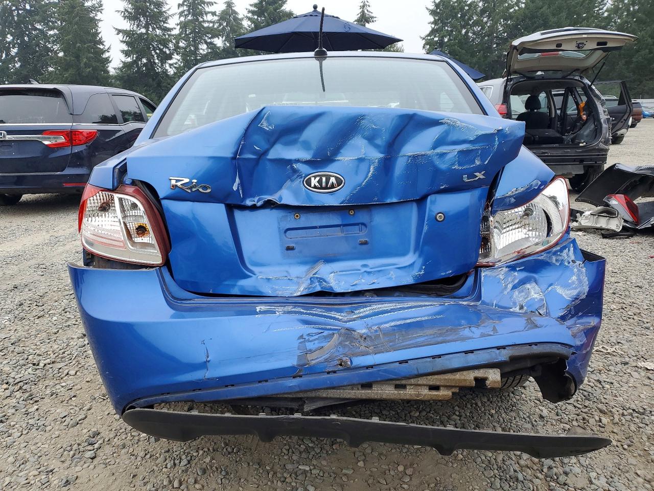 2010 Kia Rio Base Blue vin: KNADH4A33A6635106